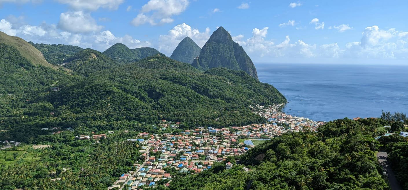 Mauritius skyline with waterfront buildings and mountains in the background